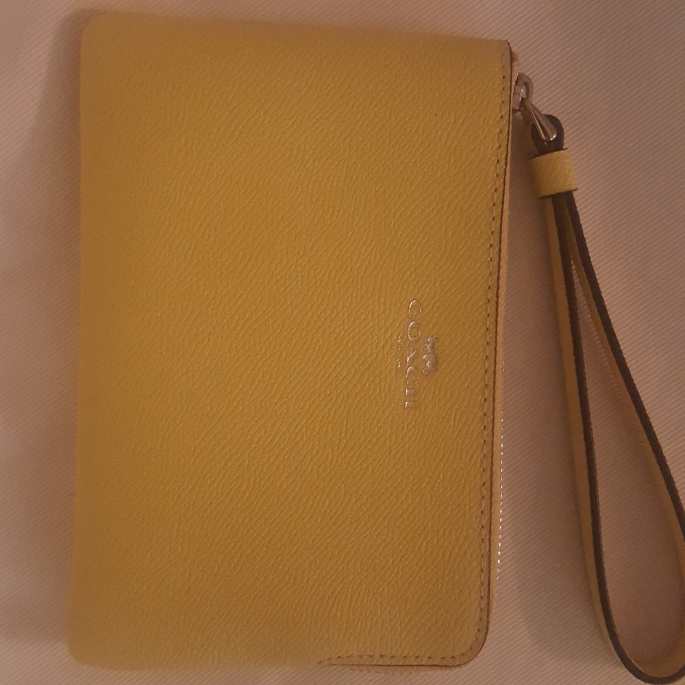 Brand new Coach wristlet